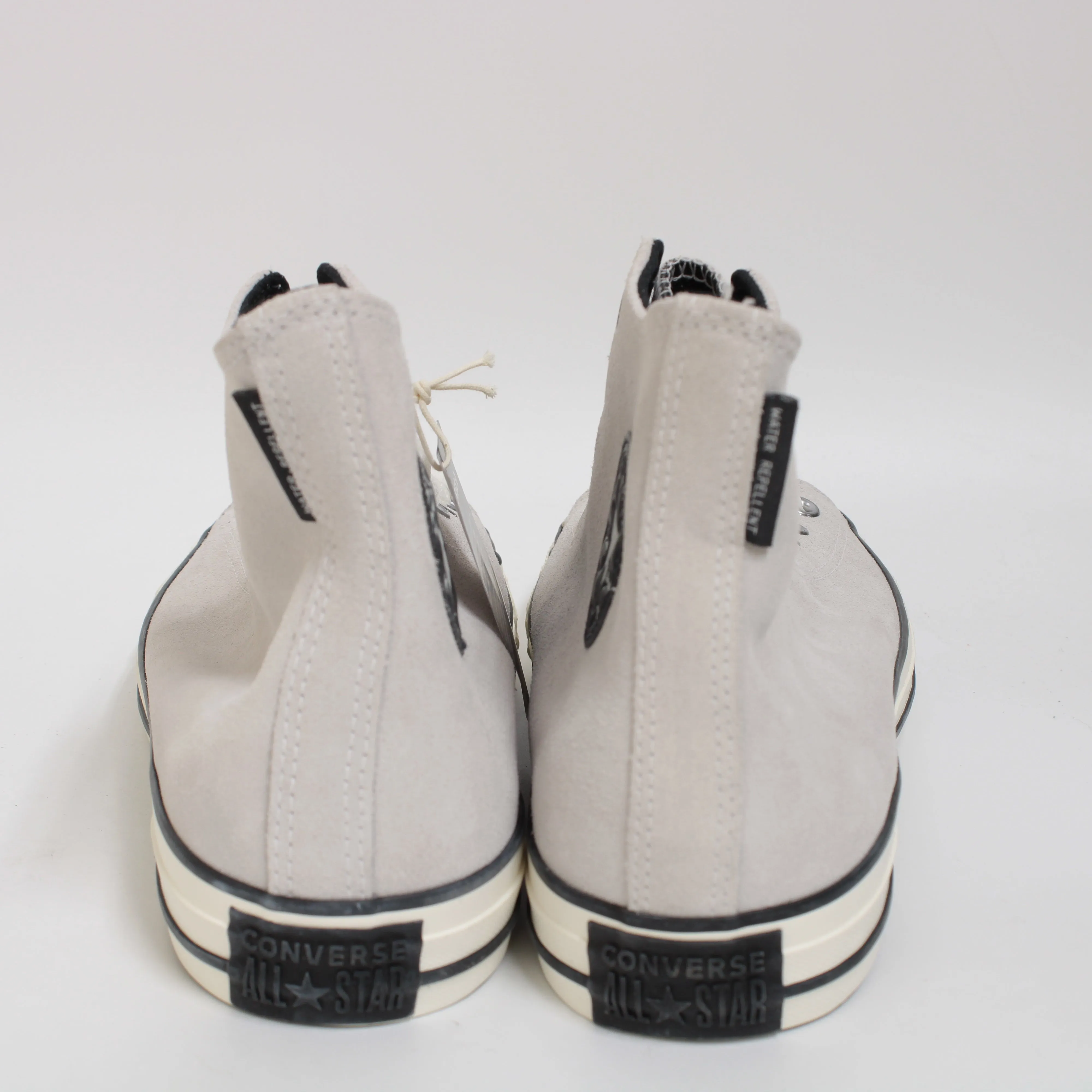 Converse Hi Top Sneakers in Pale Putty, Black, and Egret