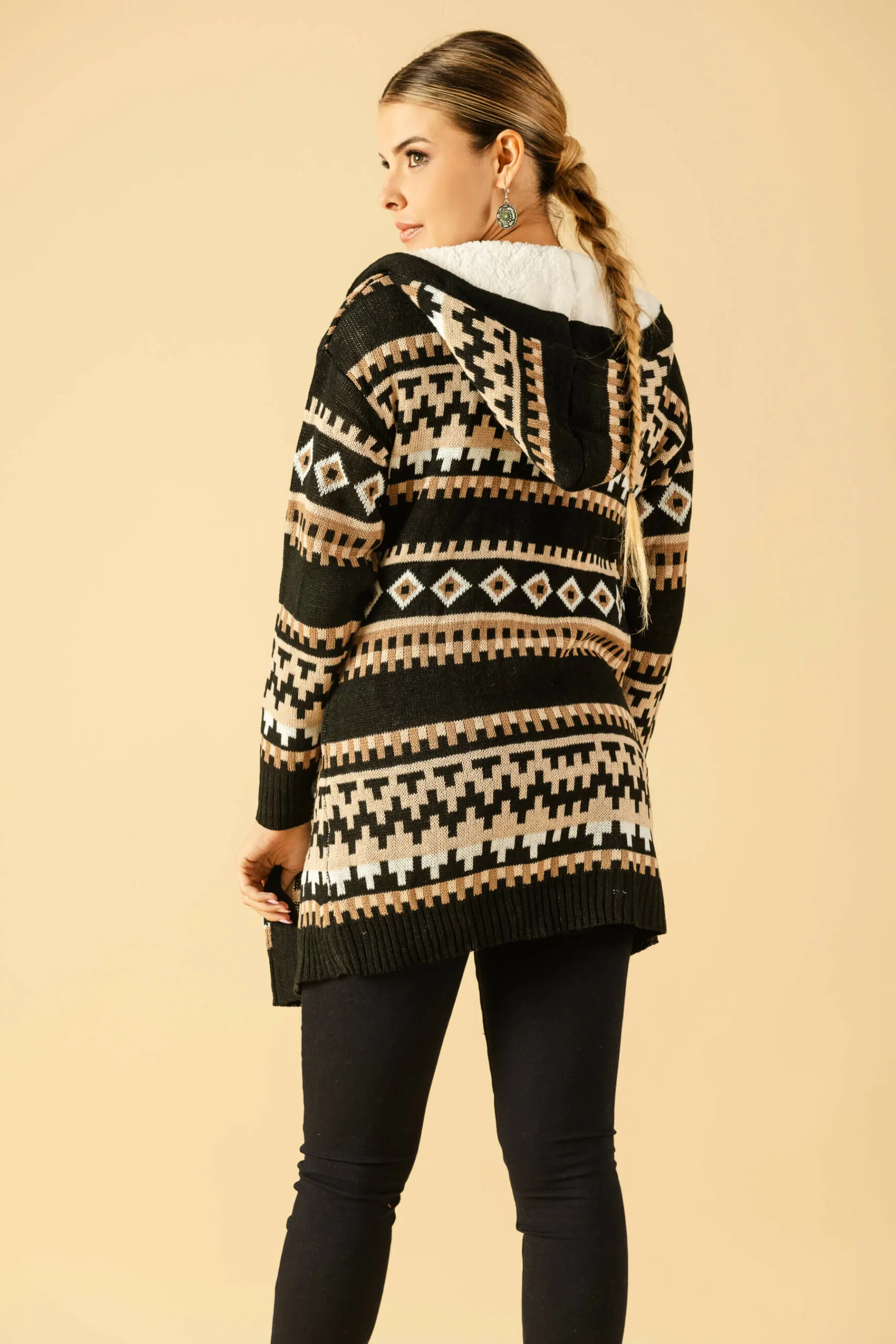 Hooded cardigan with Aztec print.