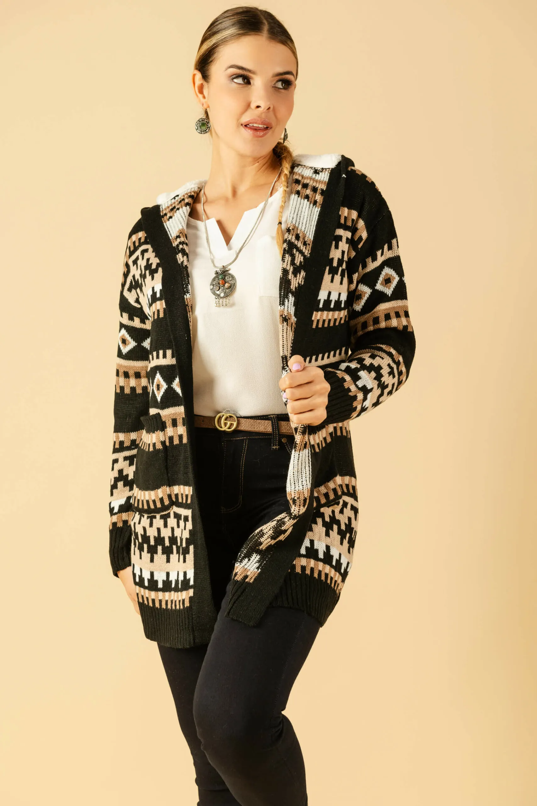 Hooded cardigan with Aztec print.