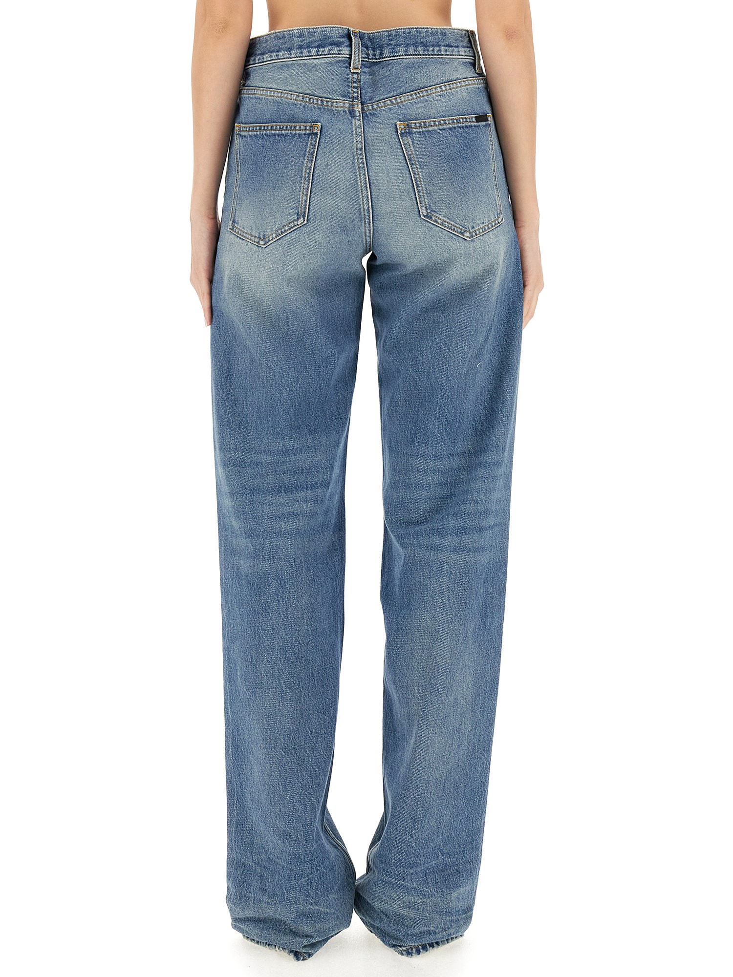 SAINT LAURENT    EXTRA-LONG BAGGY DENIM JEANS WITH WRINKLED EFFECT